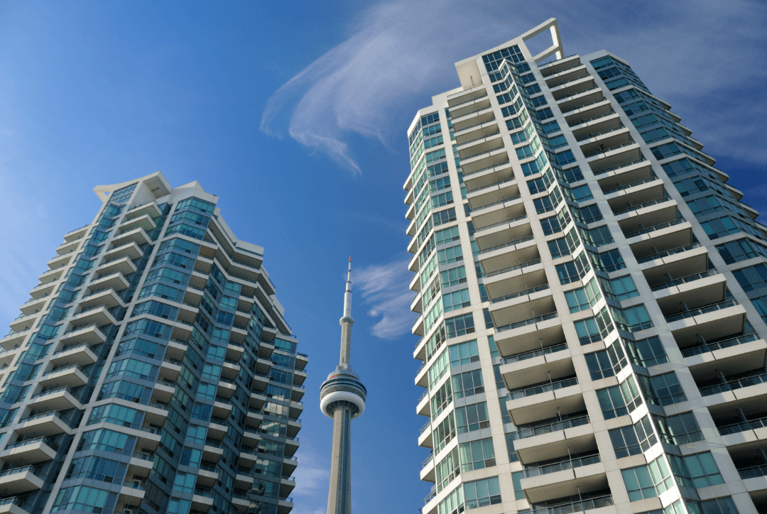 two condo buildings and cn tower